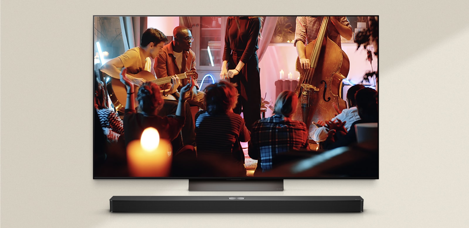 LG TV and soundbar in a cozy concert scene.
