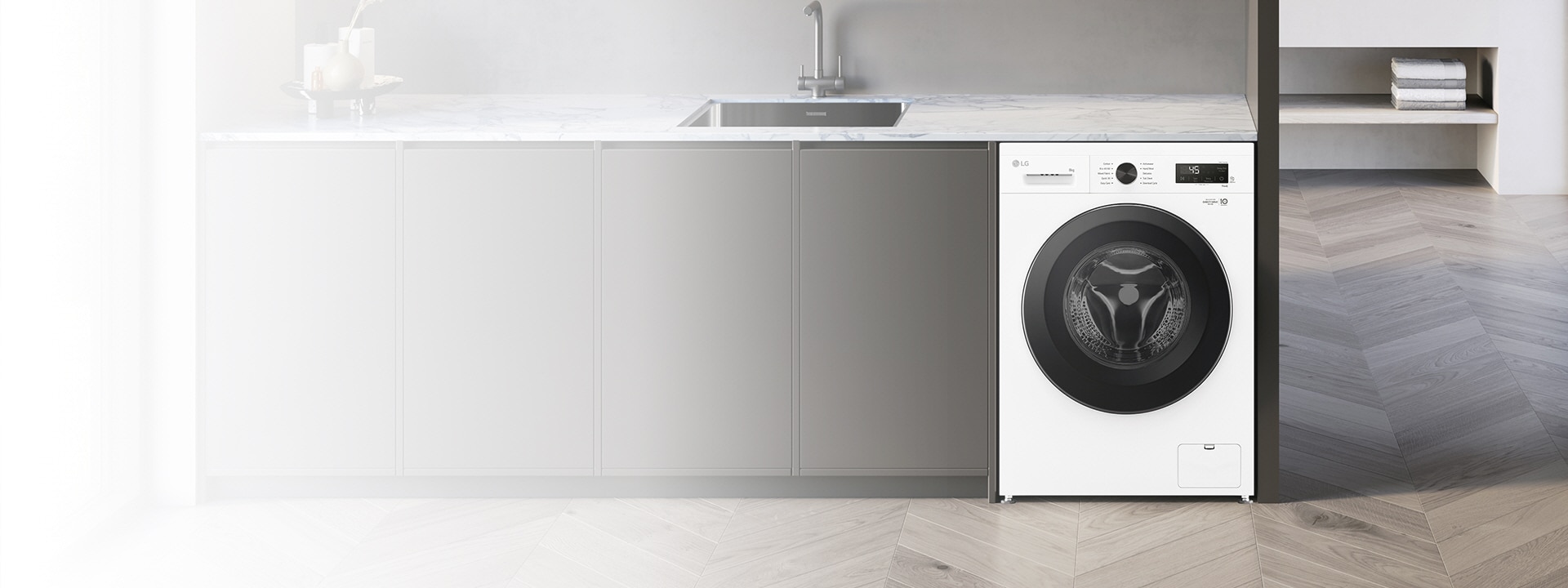 LG 9kg front load washer in a clean interior setting.